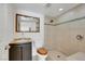 Well-lit bathroom featuring a walk-in shower and a stylish vanity with ample counter space at 1385 Morning Sun Way, Las Vegas, NV 89110
