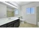 Bathroom featuring tile flooring, a vanity, and a shower and tub combo at 1385 Morning Sun Way, Las Vegas, NV 89110