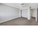 A bedroom with closet, ceiling fan and neutral paint and carpet at 1385 Morning Sun Way, Las Vegas, NV 89110