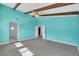 Spacious bedroom offering multiple windows, a ceiling fan, and an en-suite bathroom at 1385 Morning Sun Way, Las Vegas, NV 89110
