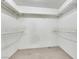 Walk-in closet with wire racking and carpeted floors at 1385 Morning Sun Way, Las Vegas, NV 89110