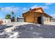 Large home with a utility shed, spacious lot, and a secure gated entrance, offering privacy and functionality at 1385 Morning Sun Way, Las Vegas, NV 89110