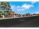 Charming home with a secure gated entrance and lush green trees, offering both privacy and curb appeal at 1385 Morning Sun Way, Las Vegas, NV 89110