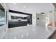 Open-concept kitchen with bar counter overlooking the backyard at 1385 Morning Sun Way, Las Vegas, NV 89110