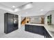 Open kitchen showcases granite countertops and stainless steel double ovens at 1385 Morning Sun Way, Las Vegas, NV 89110