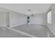 Bright living room features tiled flooring, neutral walls, and natural light at 1385 Morning Sun Way, Las Vegas, NV 89110