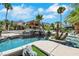 Resort-style pool features rock waterfall and lush landscaping; perfect backyard for entertaining and relaxing at 1385 Morning Sun Way, Las Vegas, NV 89110