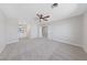 Bright bedroom with ceiling fan, ensuite bathroom, and walk-in closet for ample storage at 1511 Irene Dr, Boulder City, NV 89005