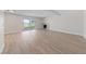 Open-concept living room with flooring and large glass doors offering backyard views at 1511 Irene Dr, Boulder City, NV 89005