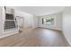 Spacious living room with staircase, sleek flooring and large window at 1511 Irene Dr, Boulder City, NV 89005