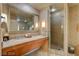 Contemporary bathroom with dual sinks, spacious shower, and high-end finishes at 211 E Flamingo Rd # 615, Las Vegas, NV 89169