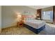 Cozy bedroom with a comfortable queen-size bed, a city view, and a contemporary design at 211 E Flamingo Rd # 615, Las Vegas, NV 89169