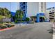 Modern Platinum Hotel & Spa featuring a covered entrance and well-manicured landscaping at 211 E Flamingo Rd # 615, Las Vegas, NV 89169