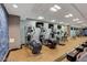 Bright gym featuring ellipticals, bikes, rowing machine and mounted televisions at 211 E Flamingo Rd # 615, Las Vegas, NV 89169