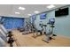 Modern gym with treadmills, stationary bikes, and wall-mounted TVs for entertainment at 211 E Flamingo Rd # 615, Las Vegas, NV 89169