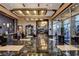 Inviting hotel lobby with modern decor, marble floors, a market area, and comfortable seating at 211 E Flamingo Rd # 615, Las Vegas, NV 89169
