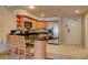 An open kitchen with stainless steel appliances and a breakfast bar with seating at 211 E Flamingo Rd # 615, Las Vegas, NV 89169