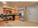 Contemporary kitchen featuring stainless appliances, sleek black countertops, and ample storage at 211 E Flamingo Rd # 615, Las Vegas, NV 89169