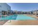 Bright and sunny resort-style pool with sun loungers and umbrellas at 211 E Flamingo Rd # 615, Las Vegas, NV 89169