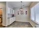 Inviting breakfast nook featuring natural light, tile flooring and granite counters at 2111 Tiger Links Dr, Henderson, NV 89012