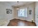 Dining Area boasts gorgeous hardwood floors, natural light and decorative lighting at 2111 Tiger Links Dr, Henderson, NV 89012
