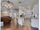 Open-concept living space with hardwood flooring, stainless appliances and living area at 2111 Tiger Links Dr, Henderson, NV 89012
