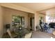 Inviting covered patio with outdoor seating, perfect for relaxing and enjoying the backyard view at 2111 Tiger Links Dr, Henderson, NV 89012