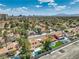Picturesque aerial shot displaying the property's setting within a lush, green neighborhood close to city amenities at 2504 La Solana Way, Las Vegas, NV 89102