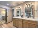 A bright bathroom featuring dual vanities, modern fixtures, and ample counter space at 2504 La Solana Way, Las Vegas, NV 89102