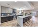 Modern kitchen featuring stainless steel appliances, a large island with seating, and stylish cabinetry at 2504 La Solana Way, Las Vegas, NV 89102