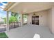 Spacious covered patio with ceiling fan, providing a comfortable outdoor living area at 2504 Libretto Ave, Henderson, NV 89052