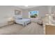 Cozy bedroom with neutral walls, carpet flooring, a ceiling fan, and a window view at 2504 Libretto Ave, Henderson, NV 89052