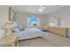 Cozy bedroom with neutral walls, carpet flooring, a ceiling fan, and a window view at 2504 Libretto Ave, Henderson, NV 89052