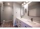 Modern bathroom with double sink vanity, framed mirrors, and modern faucets at 2545 Divine Sky Dr, Henderson, NV 89044
