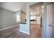 Open-concept floor plan with views into kitchen and dining area, showcasing modern design at 2545 Divine Sky Dr, Henderson, NV 89044