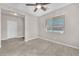 Neutral bedroom with a ceiling fan and tile floors at 261 Via Morelli, Henderson, NV 89011