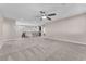Bonus room with ceiling fan and staircase with wood banister at 261 Via Morelli, Henderson, NV 89011