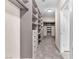 Walk-in closet featuring custom shelving and drawer storage at 261 Via Morelli, Henderson, NV 89011