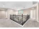 Hallway with wood banister and open layout at 261 Via Morelli, Henderson, NV 89011