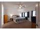 Spacious bedroom with carpet flooring, ceiling fan, bay windows and ample natural light at 2640 Torch Ave, North Las Vegas, NV 89081