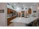 Well-lit kitchen with stainless steel appliances, a breakfast bar, and plenty of cabinet and counter space at 2640 Torch Ave, North Las Vegas, NV 89081