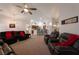 Open-concept living room connecting to the kitchen, creating a great space for entertaining at 2640 Torch Ave, North Las Vegas, NV 89081