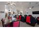 Spacious living room with a dining area and modern lighting fixtures providing an inviting, open concept atmosphere at 2640 Torch Ave, North Las Vegas, NV 89081