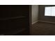 Bedroom featuring carpet flooring, closet with shelving, and a window at 2777 Beaconfalls Way, Las Vegas, NV 89142