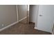 Bedroom featuring mirrored closet doors and neutral walls at 2777 Beaconfalls Way, Las Vegas, NV 89142