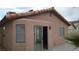 The home's exterior features a stucco facade and tile roof at 2777 Beaconfalls Way, Las Vegas, NV 89142