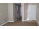 Entry way featuring fresh paint, plush carpet, and white trim and doors at 2777 Beaconfalls Way, Las Vegas, NV 89142