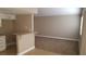 Spacious living room features tile flooring and bar area at 2777 Beaconfalls Way, Las Vegas, NV 89142
