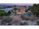 Aerial view of the backyard showing the pool and waterfall feature along with the extensive balcony at 2793 Red Arrow Dr, Las Vegas, NV 89135