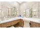 This lovely bathroom features a beautiful textured wall covering, and a make-up vanity area at 2793 Red Arrow Dr, Las Vegas, NV 89135